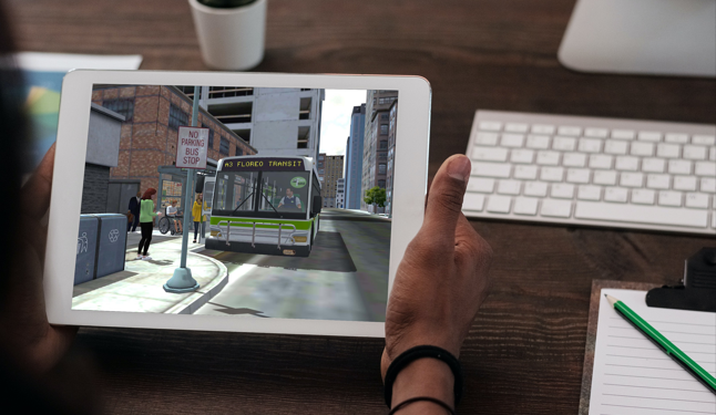 iPad in the hands of an African-American woman in the office_BUS400 iPad in the hands of an African-American woman in the office_BUS400